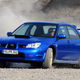 Illustration for article titled Subaru Impreza WRX and STI VS. Mitsubishi Lancer Evolution: Who Ya Got?